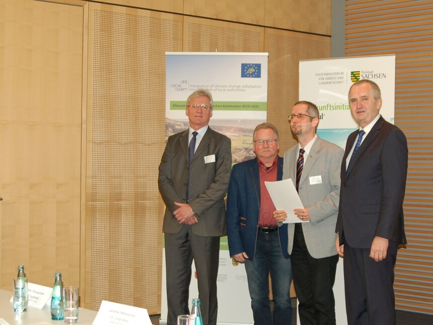 Präsident Eichkorn und Prof. Braun gemeinsam mit Staatsminister Schmidt